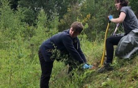 2 children (aged 14 - 18) partaking in conservation work at Rainton Meadows.