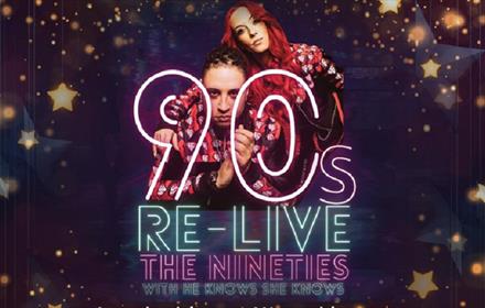 'Re-Live the Nineties' - Shanna and Silvar posing together against a background of fairy lights and twinkly stars.