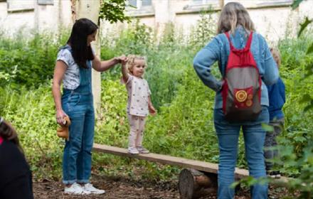 Children and adults exploring the beautiful grounds at Ushaw.