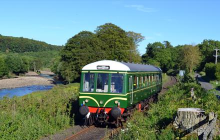 Weardale Railway Class 122 'bubble car', travelling through the Durham countryside.