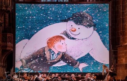 Snowman animation on the big screen with a live orchestra.