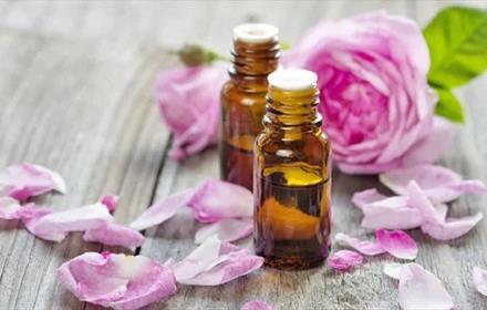 Aromatherapy bottles with pink rose/rose petals