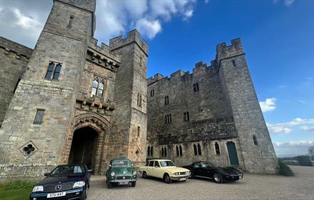 Classic cars parked in front of Raby Castle