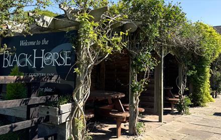 Outdoor, covered picnic area at The Black Horse Beamish