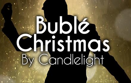 silhouette image of the tribute act with the wording Buble Christmas by Candlelight
