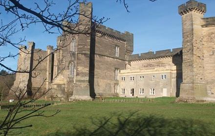 Exterior view of the walls and towers of Brancepeth castle