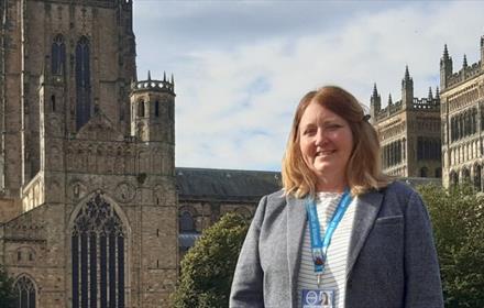 Laura Rhodes in front of Durham Cathedral