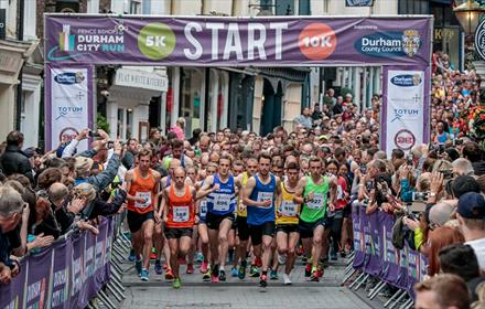 runners set off rom the start line of Durham City Run
