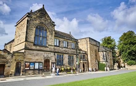 Image of Palace Green Library's exterior on a sunny day.