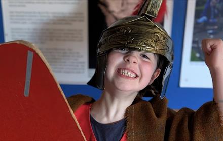 A child dressed as a Roman