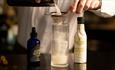 Someone mixing a drink at Geko Japanese restaurant in Seaham Hall Serenity Spa
