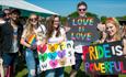 Crowds gather in rainbow colours to celebrate Durham Pride.