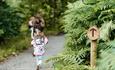 Children walking along trail.