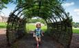 Child playing in the grounds of Ushaw Historic house