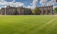 Auckland Palace exterior with lawn area to foreground