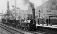 People boarding a team train