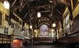 Durham Town Hall Great Hall, beams, stained glass window, fireplace, lights