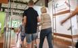 Image of a family visiting the Museum of Archaeology at Palace Green Library.