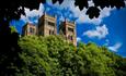 Durham Cathedral view of west and central towers with trees in foreground