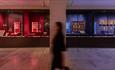 Blurred image of a person walking through The Faith Museum.