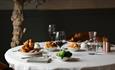 Table showing Sunday Lunch and sides at Seaham Hall Hotel.