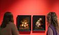 Gallery shot of two women looking at paintings by Joséphine Bowes in the From Joséphine Bowes: Trendsetters and Trailblazers exhibition.