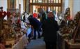 People browsing stalls at The Christmas Gift Fair at Ushaw.