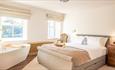 Bedroom with bath in the corner