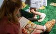 Child reading a Ladybird book
