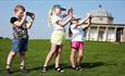 Three children at Hardwick Park using App