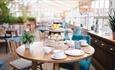 Glass House restaurant with a table set for afternoon tea