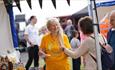 People looking at a stall at the festival