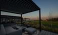 outside seating area with views of the coast