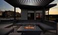outside seating area with fire pit