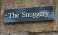 A sign saying The Snuggery