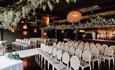 Bowburn Hall staged beautifully for a wedding with rows of chairs and floral decorations.