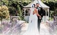 Bride and Groom embracing in the landscaped gardens at Bowburn Hall Hotel