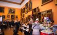 Visitors browsing stalls at The Bowes Museum Winter Market. ©TheBowesMuseum