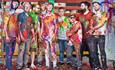 Group 'Young Pilgrims' covered in colourful paint.