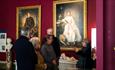 People looking at an exhibition at The Bowes Museum