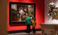 Two children gazing at a floral painting at The Bowes Museum - The Joséphine Bowes Trendsetters and Trailblazers Exhibition