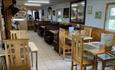 Tables and chairs inside cafe