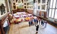 Visitors on a Castle Tour in the Great Hall of Durham Castle