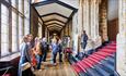 Tour group being shown the Tunstall Gallery at Durham Castle