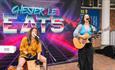 two women performing and singing music at Chester-le-eats food festival.