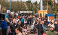 Crowds of people and food stalls at Chester-le-Eats food festival.