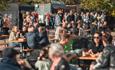 crowds of people sat eating and drinking at Chester-le-Eats food festival.