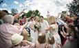 Weddings party with confetti being thrown