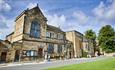 Image of Palace Green Library's exterior on a sunny day.