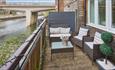 Seating area on balcony overlooking the river Wear at Waterside, Durham City